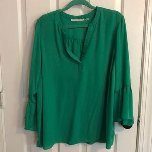 Green top with ruffle sleeve